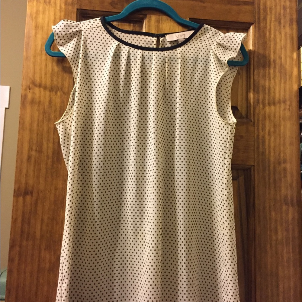 Precious Loft olive and cream polka dot shell!